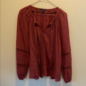 American Eagle maroon, flowing long sleeve.